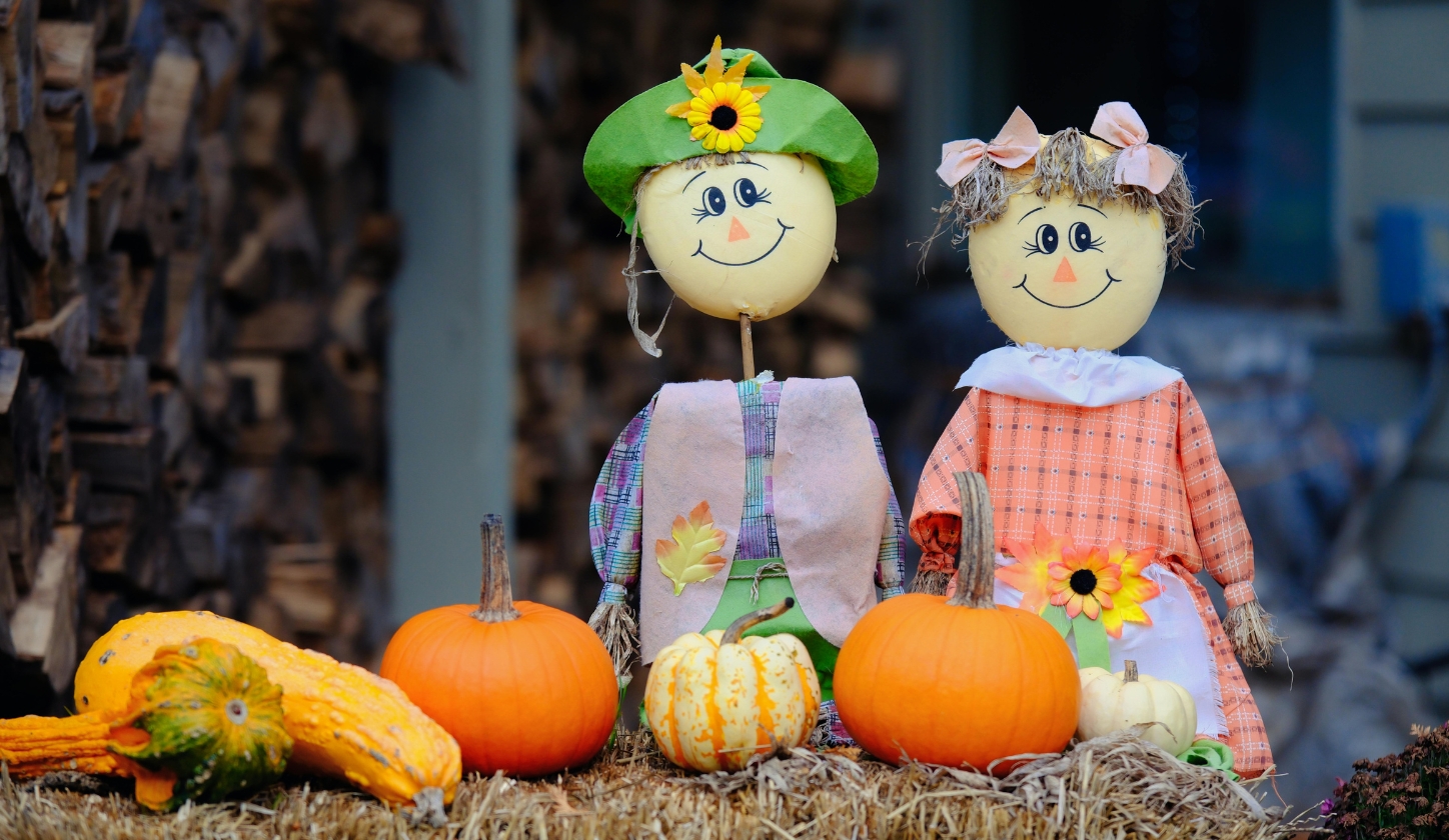 Fall display with scarecrow couple