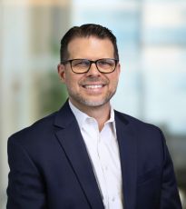 Headshot of Tom Burden