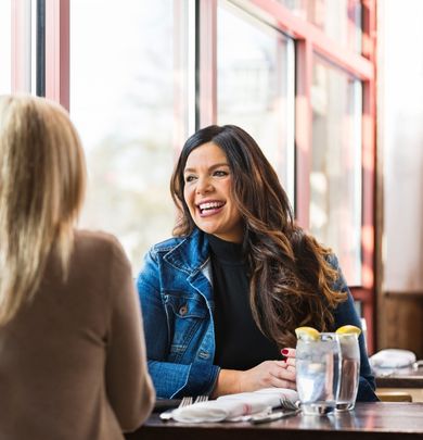 Woman smiling in a restaurant 