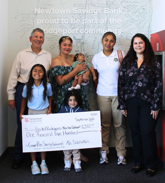 Rodriguez family with CEO and Customer Experience Manager