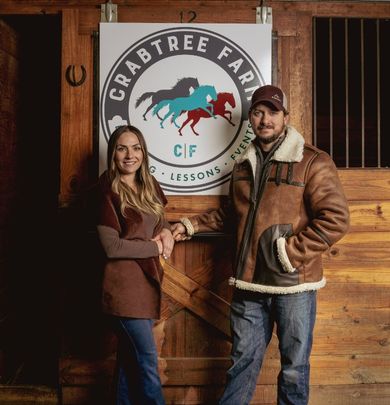 Young couple in a barn