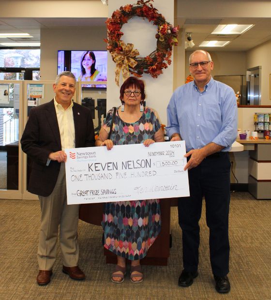 Great Prize Savings Winner Keven Nelson standing with CEO, Ken Weinstein and CEM, Humberto Navarro