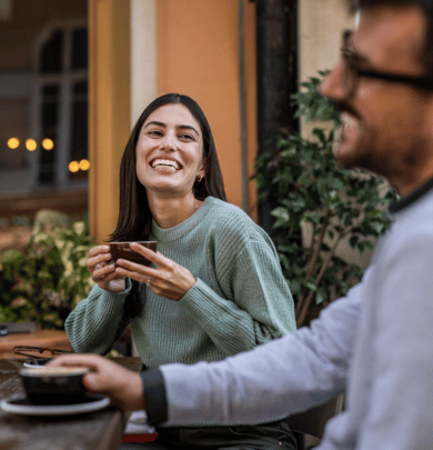 Women smiling with coffee