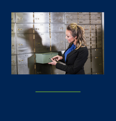 Picture of woman opening safe deposit box.