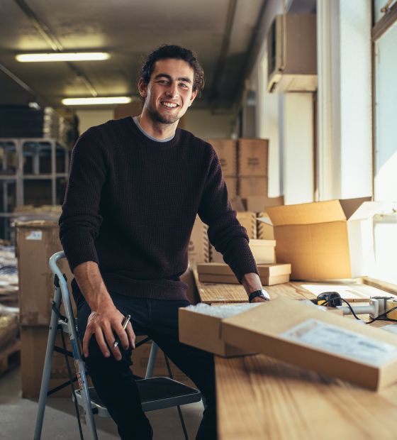 Man packaging goods